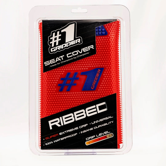 #1 Gripper Ribbed Seat Cover in red, packaged in a clear plastic blister pack with a black and white cardboard insert.